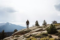 Photo of a hiking man, clear sky. 