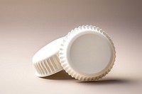 Beer cap white porcelain lighting. AI generated Image by rawpixel.