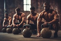 Four muscular men in a gym, focused on kettlebell exercises. Intense workout, strength training, and fitness. Group exercise with kettlebells, building muscle.