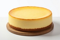 Delicious cheesecake on a wooden platter. Creamy cheesecake with a golden crust. Perfect cheesecake for dessert lovers. Cheesecake ready to serve.