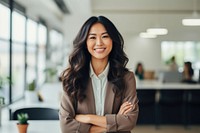 Happy asian woman smiling standing portrait office. 