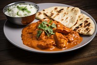 Tikka masala curry plate food naan. AI generated Image by rawpixel.