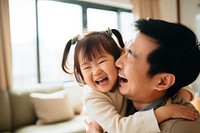 Daughter hugging happy father cheerful laughing portrait. 