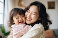 Daughter hugging happy father cheerful laughing toddler. 