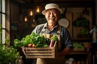 Happy old asian gardening holding food. 