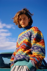 Wearing colorful sweater standing adult blue. 