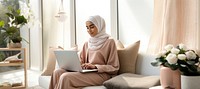 Woman working on laptop. 