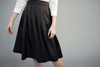 Skirt miniskirt outerwear footwear. 