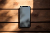 Smartphone shadow table wood. 