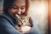 Animal portrait holding mammal. 