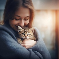 Animal portrait holding mammal. 