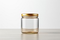 Glass container jar bottle metal white background. 