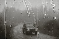 Car on a road with rain effect
