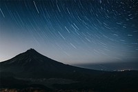 Night landscape photo with shooting stars effect
