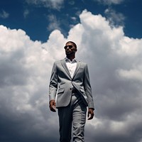 Black man cloud sky standing. 