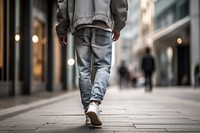 Asian a man jeans outdoors walking. 