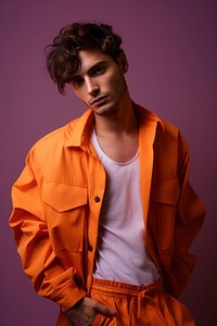 Orange clothes a man portrait photography. AI generated Image by rawpixel.
