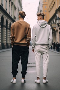 2 men outdoors footwear walking. 