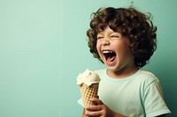 Boy laughing dessert holding. 