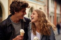 Eating ice-cream laughing outdoors adult. 