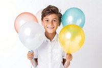 Happy boy holding balloons child smile white background. 