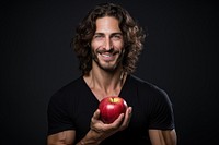 Holding apple portrait adult smile. AI generated Image by rawpixel.