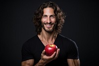 Holding apple portrait adult smile. 