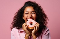 Eating biting donut adult. 