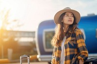 Thai woman portrait luggage travel. AI generated Image by rawpixel.