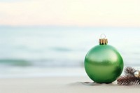 Beach Christmas background christmas decoration sphere. AI generated Image by rawpixel.