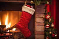 Hanging christmas stocking fireplace gift sock. AI generated Image by rawpixel.