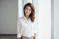 South east asian businesswoman blouse smile happy. AI generated Image by rawpixel.