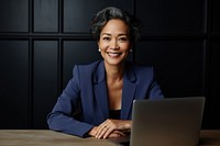 South east asian businesswoman computer sitting laptop. AI generated Image by rawpixel.