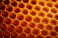 Honeycomb texture honeycomb macro photography backgrounds. AI generated Image by rawpixel.