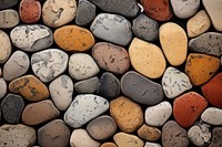 Wall texture pebble rock arrangement. AI generated Image by rawpixel.