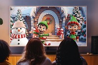 People watching Christmas animations on TV