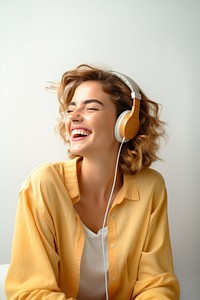 A person wearinng headphones enjoy music headset smile adult. AI generated Image by rawpixel.