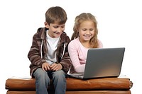 Children using computer sitting reading laptop. AI generated Image by rawpixel.