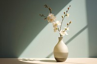 Gallery vase flower nature plant centrepiece. AI generated Image by rawpixel.
