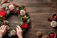 Christmas wreath female adult hand. AI generated Image by rawpixel.