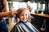 Little girl having a haircut barbershop child adult. AI generated Image by rawpixel.
