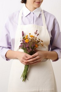 Flower apron plant hand. AI generated Image by rawpixel.