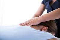 Masseur massaging back patient massage female. AI generated Image by rawpixel.