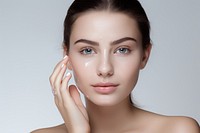 Woman apply skincare portrait adult photo. AI generated Image by rawpixel.