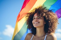 Woman holding pride flag smiling adult smile. AI generated Image by rawpixel.