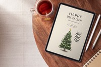 Tablet screen with Christmas tree
