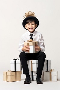 Holding gift boxes sitting child head. AI generated Image by rawpixel.