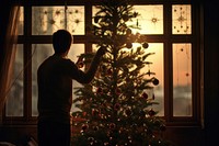 Silhouette man christmas tree light photo. AI generated Image by rawpixel.