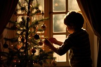 Christmas tree light silhouette photo man. AI generated Image by rawpixel.