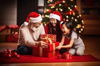 Asian family christmas box adult. AI generated Image by rawpixel.